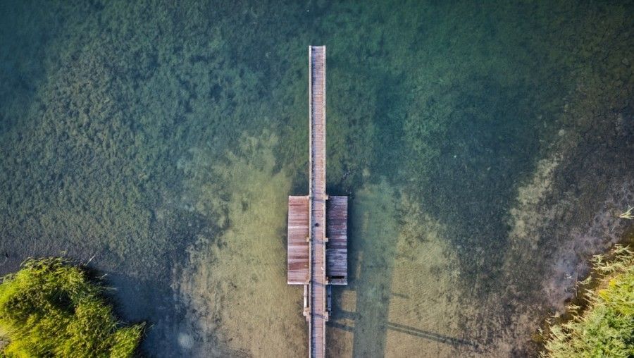 dock-in-body-of-water-during-daytime-aerial-view-photography