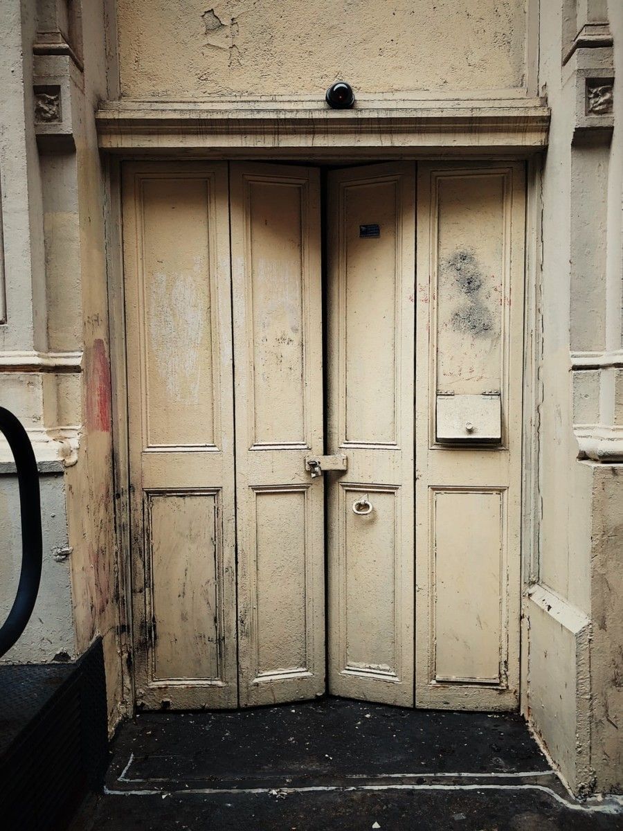 slightly-open-beige-door