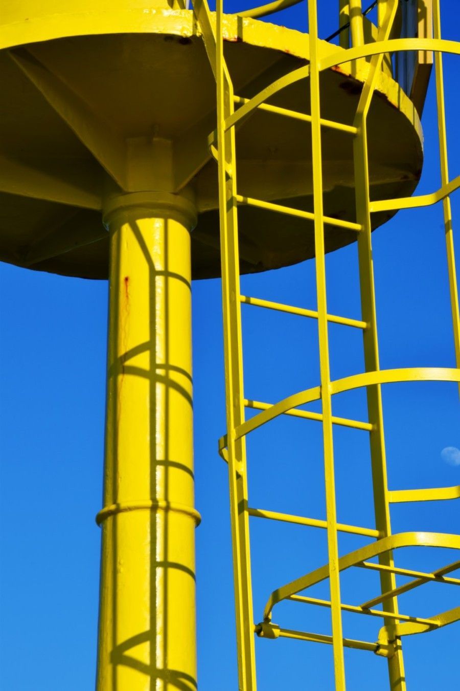 yellow-metal-framed-under-blue-skies